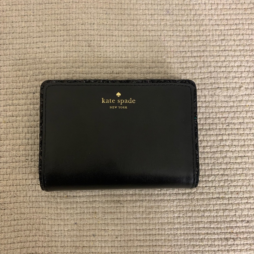 kate spade black leather compact wallet with gold logo